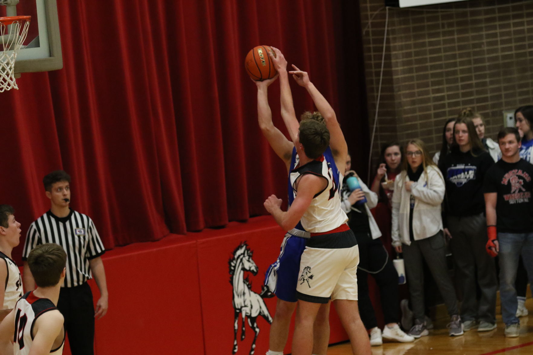 Centennial boys basketball at Sutton 9.JPG